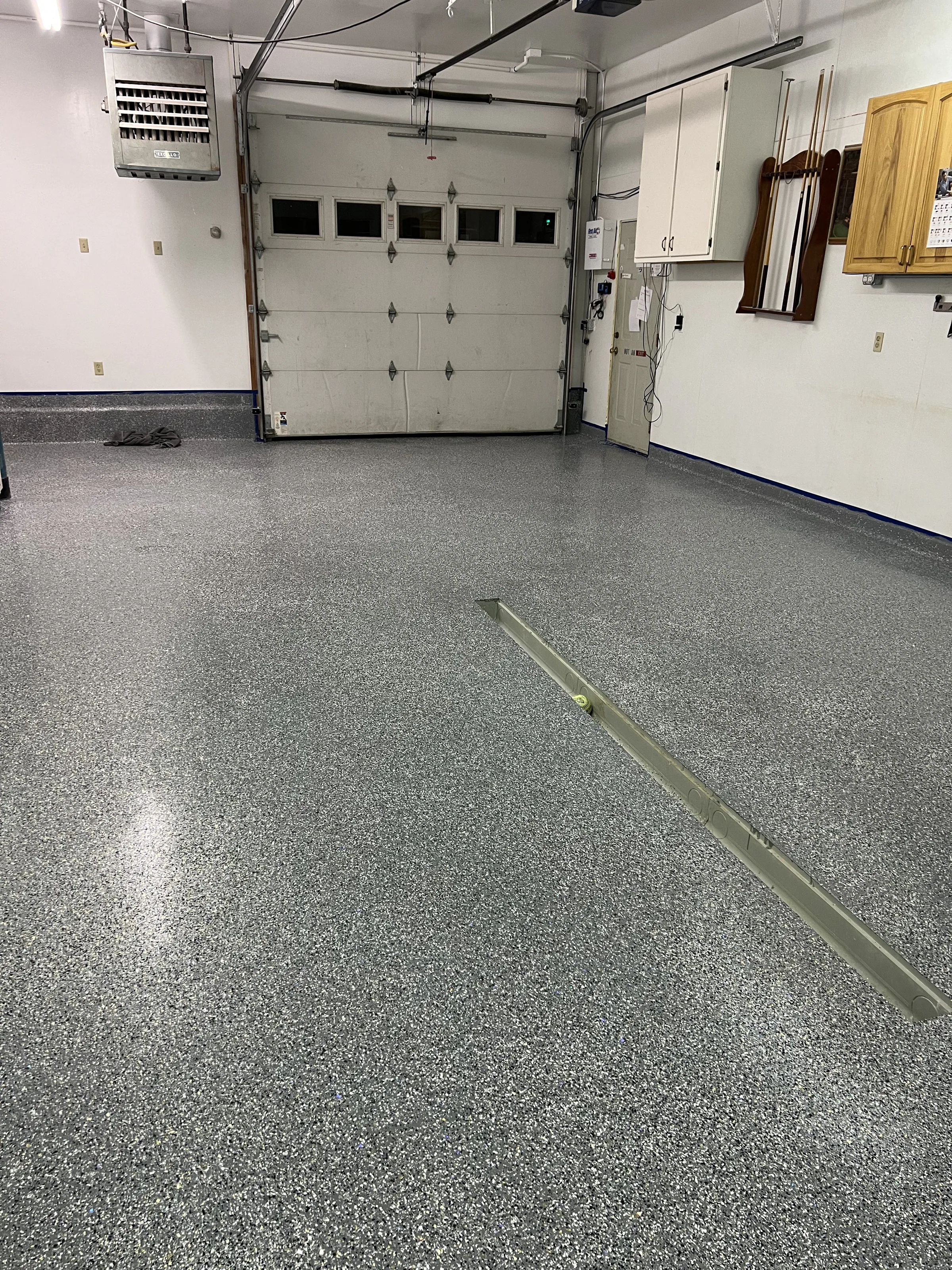 Coated concrete floor in a workshop space